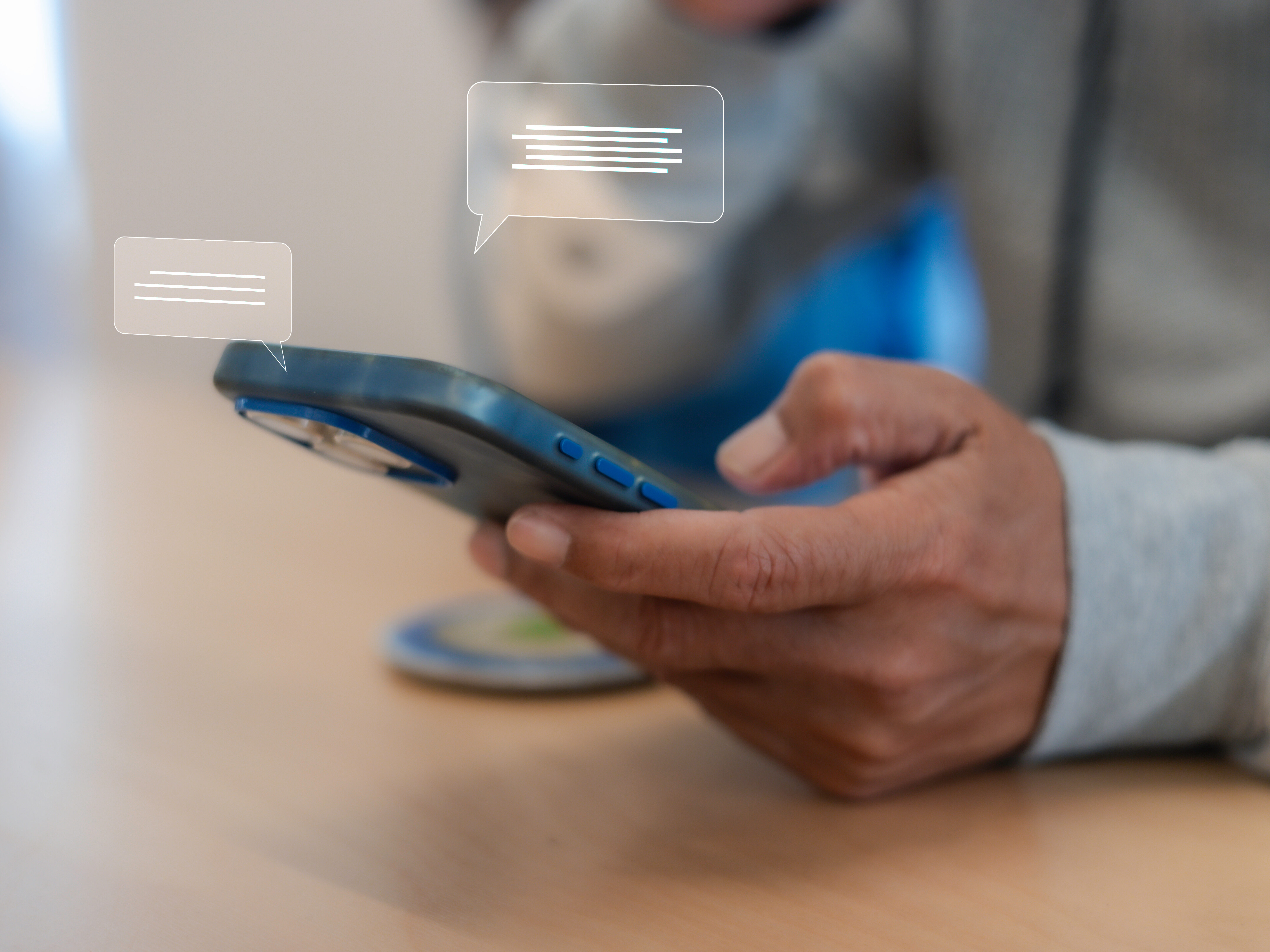 Close up man using smart phone, Social media marketing concept. hand using smartphone typing, chatting conversation in chat box icons pop up